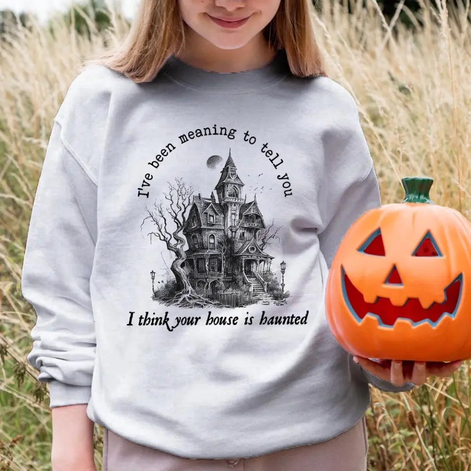 I Think You're House Is Haunted Seven Halloween Top featuring a spooky design, perfect for Halloween celebrations, made from soft cotton and polyester blend.