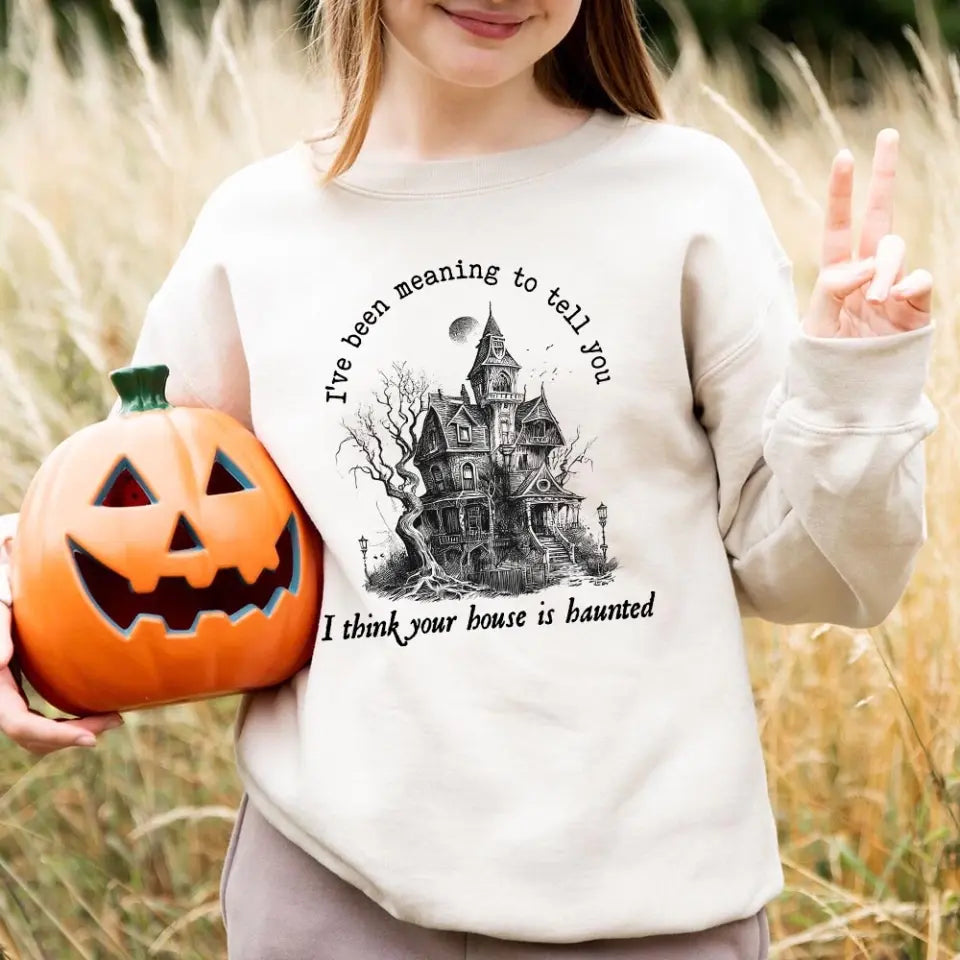 I Think You're House Is Haunted Seven Halloween Top featuring a spooky design, perfect for Halloween celebrations, made from soft cotton and polyester blend.