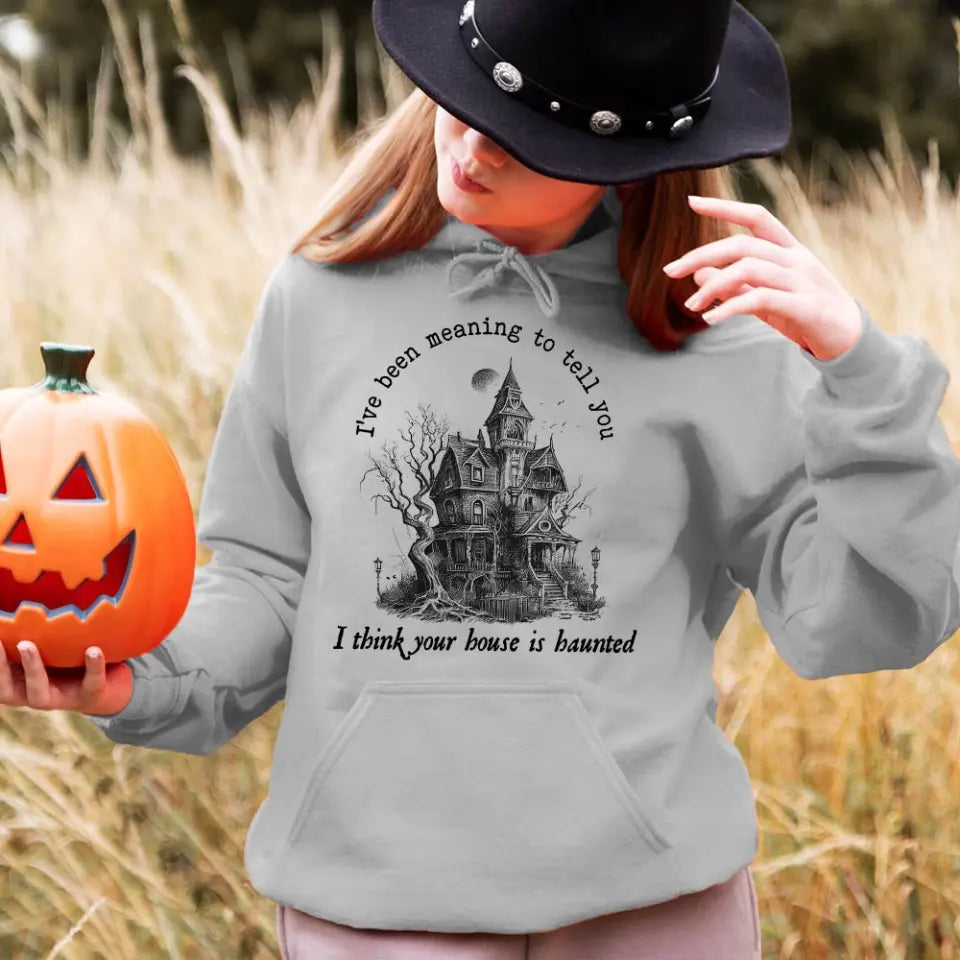 I Think You're House Is Haunted Seven Halloween Top featuring a spooky design, perfect for Halloween celebrations, made from soft cotton and polyester blend.