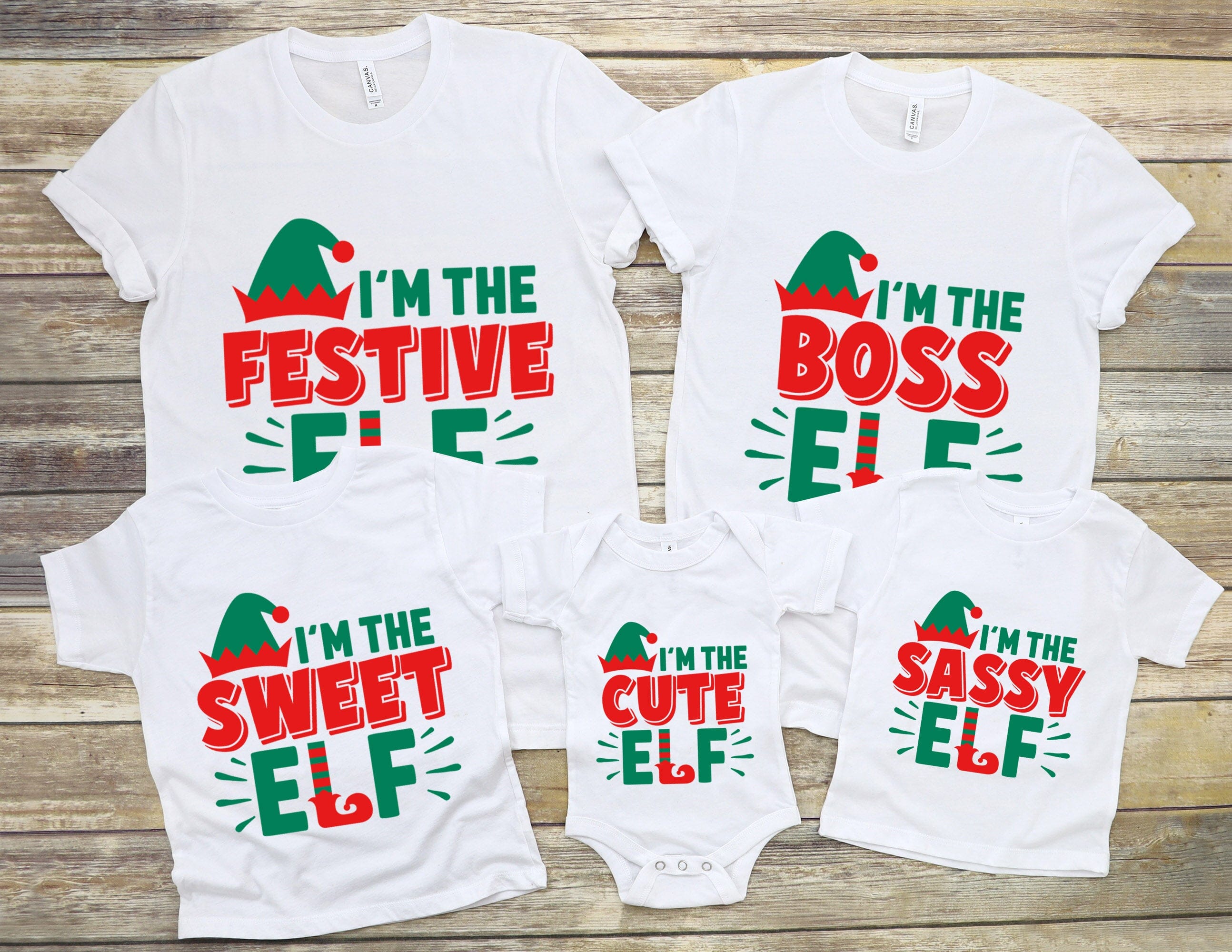 I'm The Boss Elf Christmas Tee featuring a playful design, made from soft ringspun cotton, suitable for both men and women.