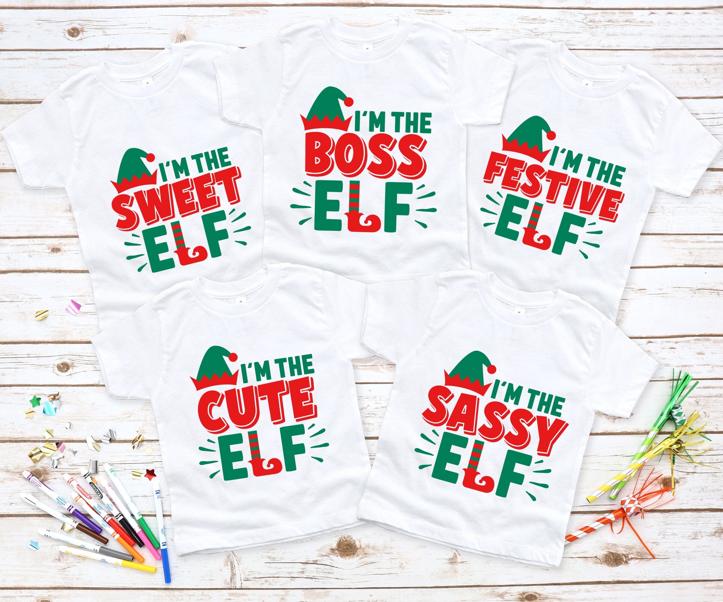 I'm The Boss Elf Christmas Tee featuring a playful design, made from soft ringspun cotton, suitable for both men and women.