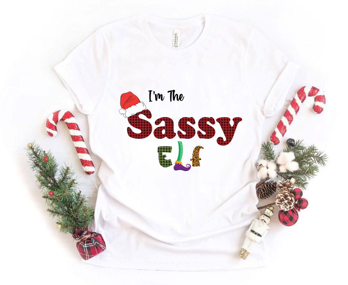 I'm The Sassy Elf Shirt in various colors, showcasing its soft fabric and stylish design.