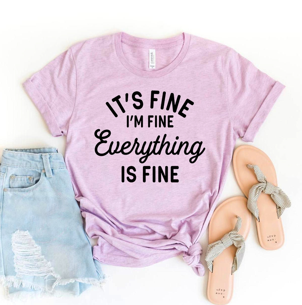 A stylish 'It's Fine I'm Fine Everything Is Fine' T-shirt made from premium ring spun cotton, featuring a humorous print.