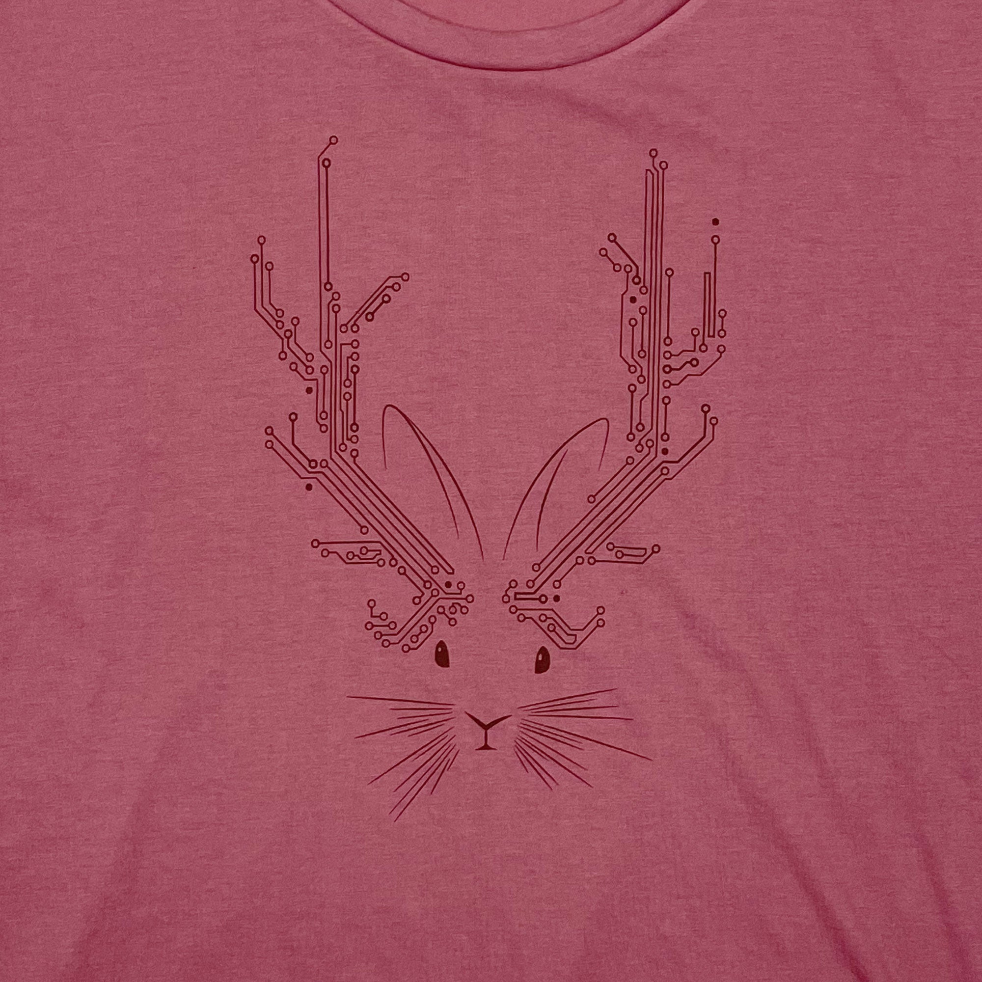 Jackalope Women's Festival T-shirt in paprika pink with unique design, showcasing relaxed scoop-neck and raw edge hem.