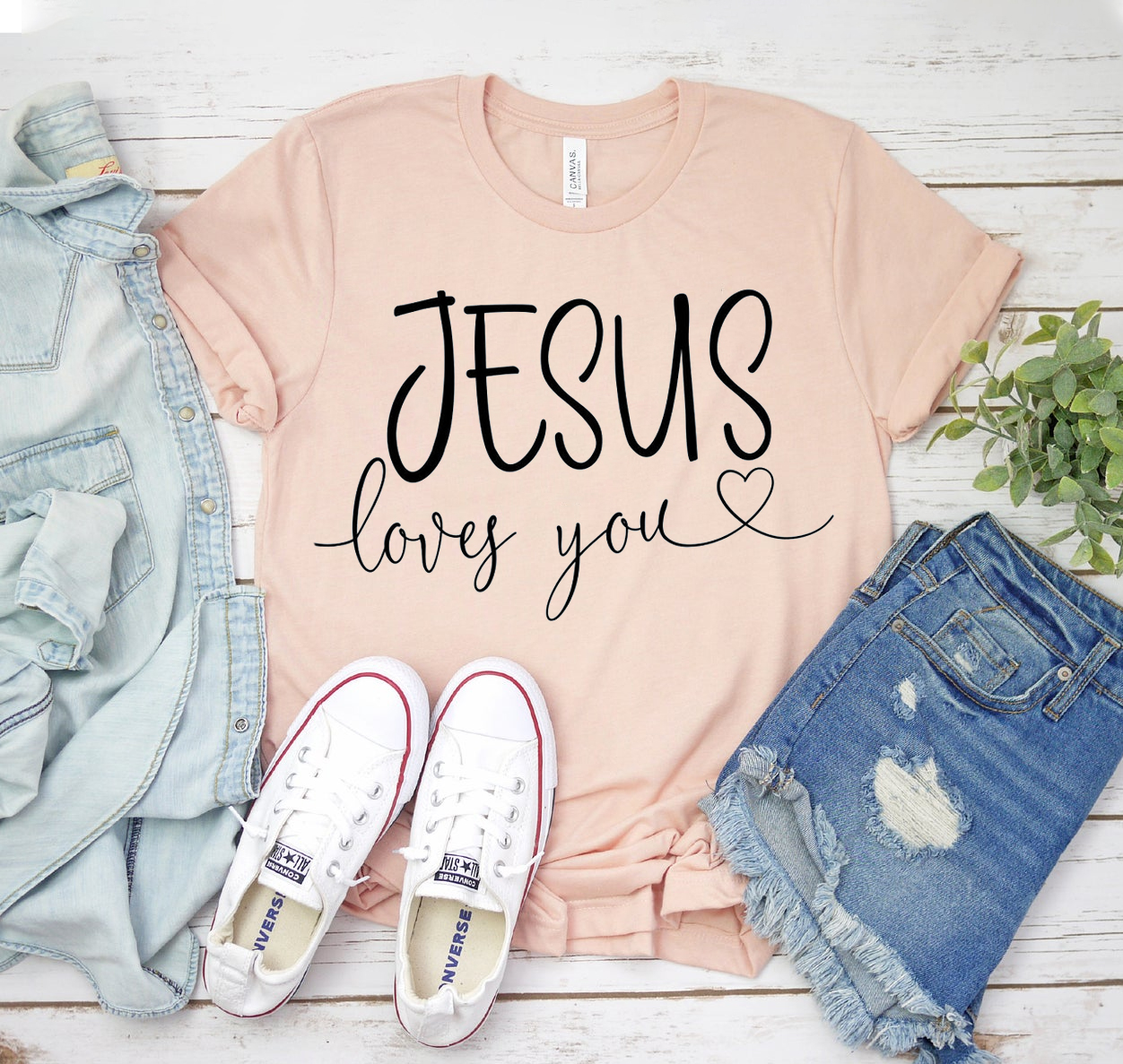 A stylish unisex Jesus Loves You T-shirt made from soft airlume cotton, featuring a classic fit and available in various sizes.