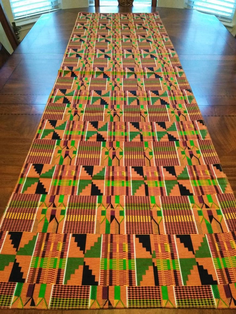 Kente African Table Runner showcasing vibrant colors and intricate patterns, made from 100% cotton fabric.