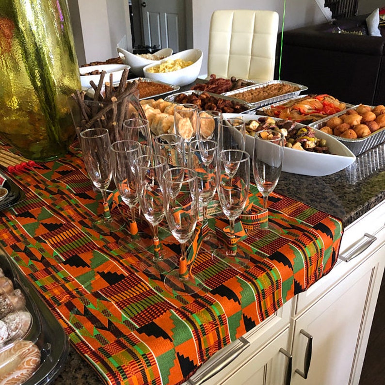 Kente African Table Runner showcasing vibrant colors and intricate patterns, made from 100% cotton fabric.