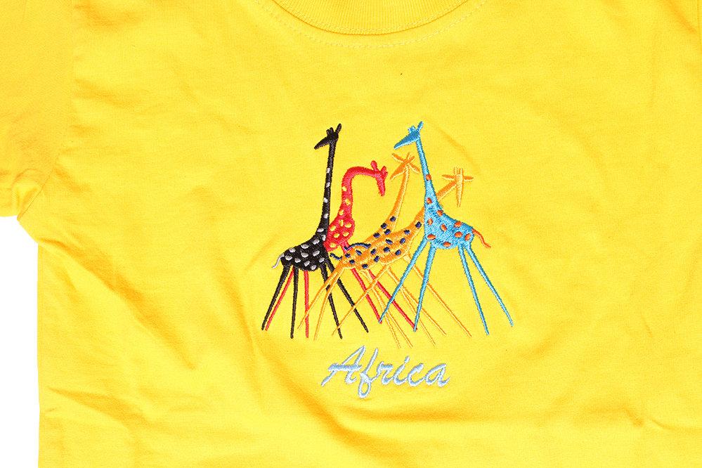 Kids' Giraffe Embroidered T-shirt in vibrant yellow, featuring a playful giraffe design and durable ribbed neckband.