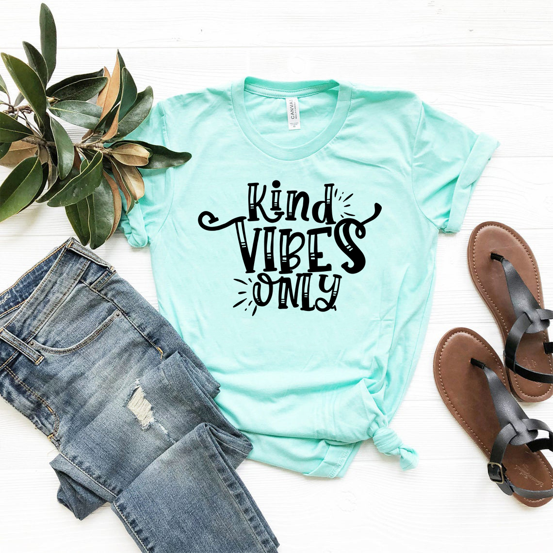 A stylish unisex Kind Vibes Only Shirt made from soft ring spun cotton, available in multiple colors and sizes.