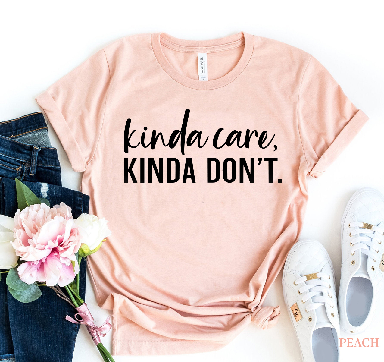 Kinda Care Kinda Don't T-shirt in various sizes, showcasing its soft fabric and vibrant print design.