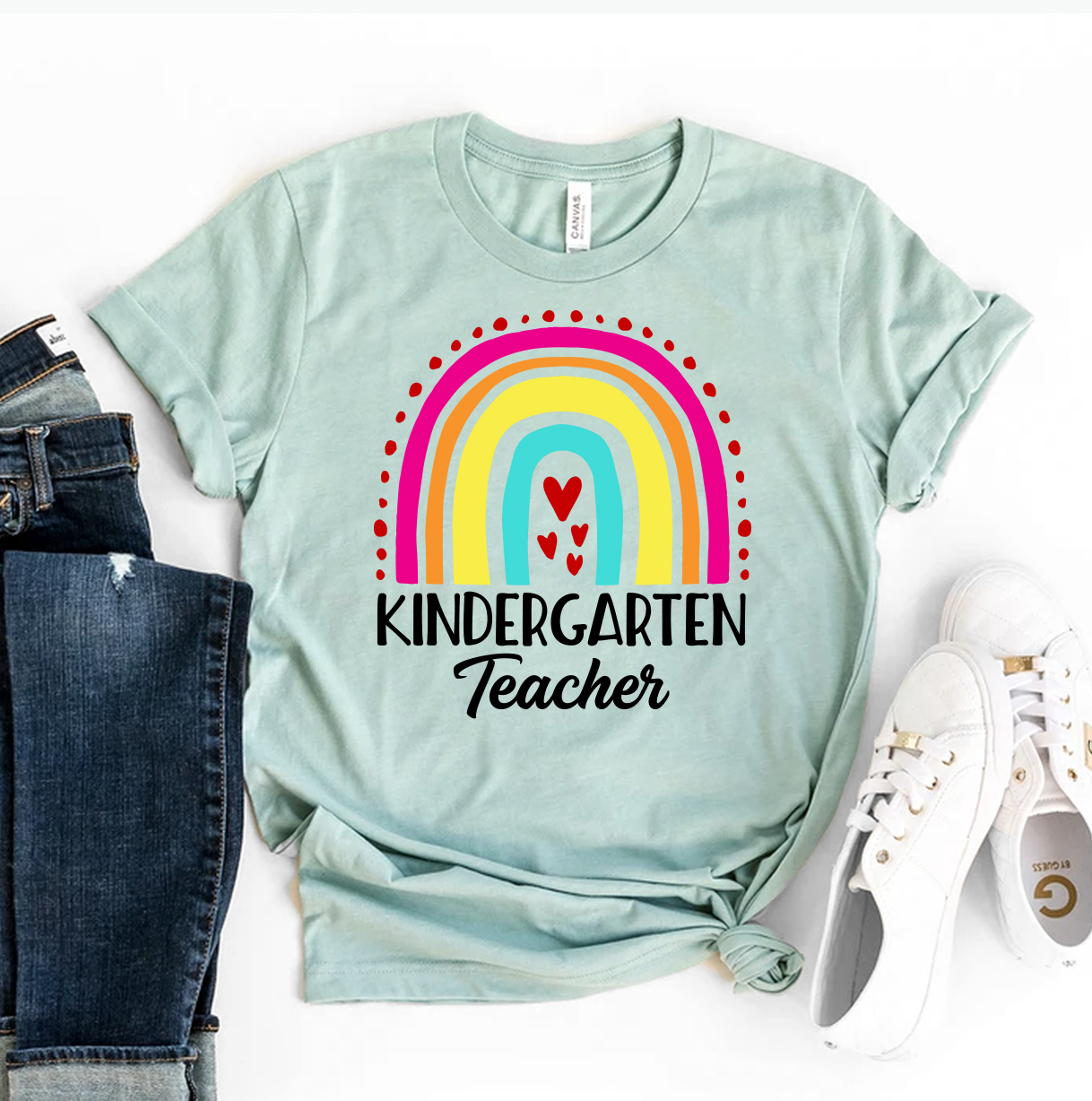 A stylish Kindergarten Teacher T-shirt made from premium ring spun cotton, featuring a vibrant design and comfortable fit.