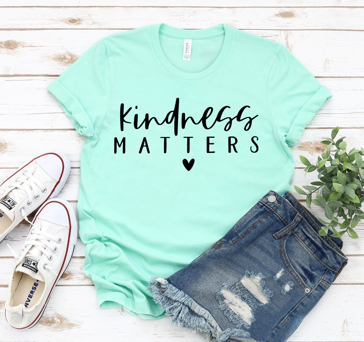 A unisex Kindness Matters T-shirt made from soft airlume cotton, featuring a positive message design.