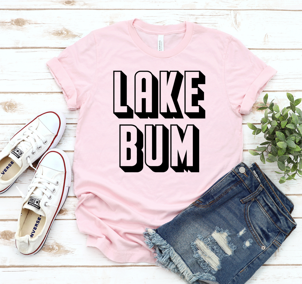 Lake Bum T-shirt in various sizes, showcasing its soft fabric and unisex design.