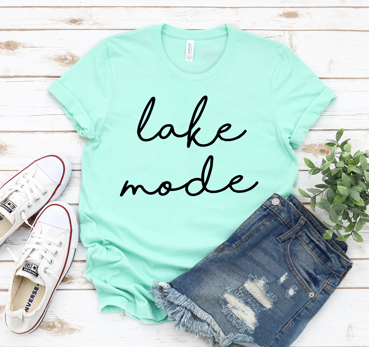 Lake Mode T-shirt in various sizes, showcasing its unisex design and soft fabric.