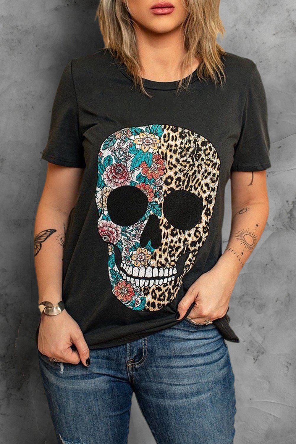 Leopard and floral skull design on a black short sleeve tee, showcasing a stylish and casual look.