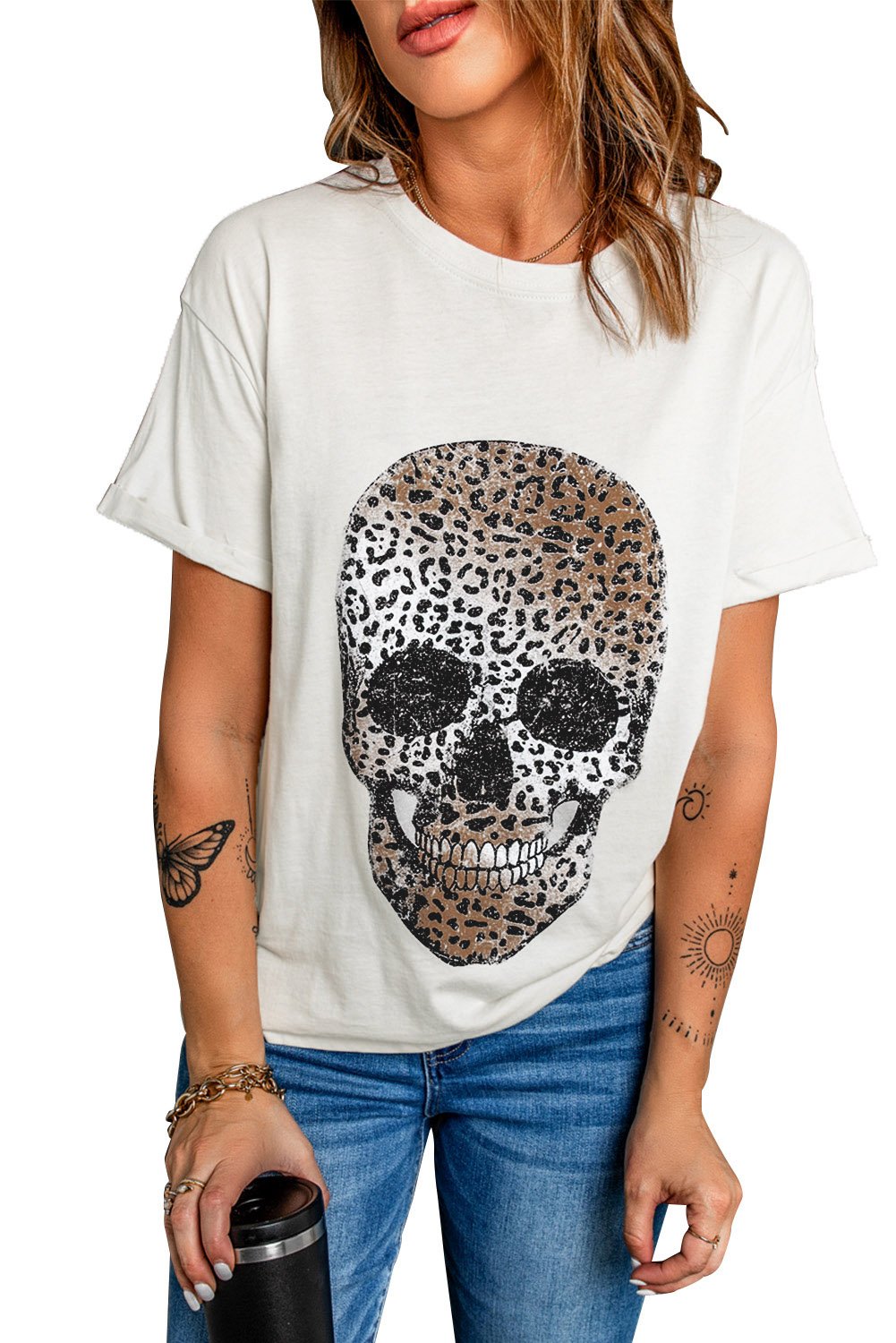 A stylish white t-shirt featuring a bold leopard skull graphic print on the front, showcasing a casual and trendy design.