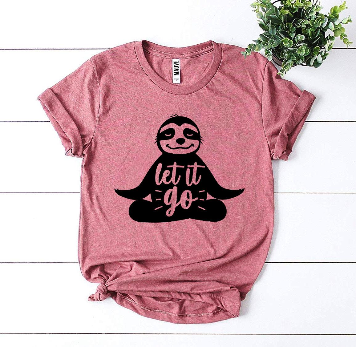 Let It Go T-shirt made from premium ring spun cotton, featuring a vibrant flex print design, available in various sizes.