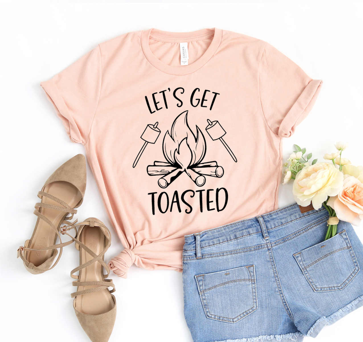 Lets Get Toasted T-shirt displayed on a hanger, showcasing its soft fabric and unisex design.