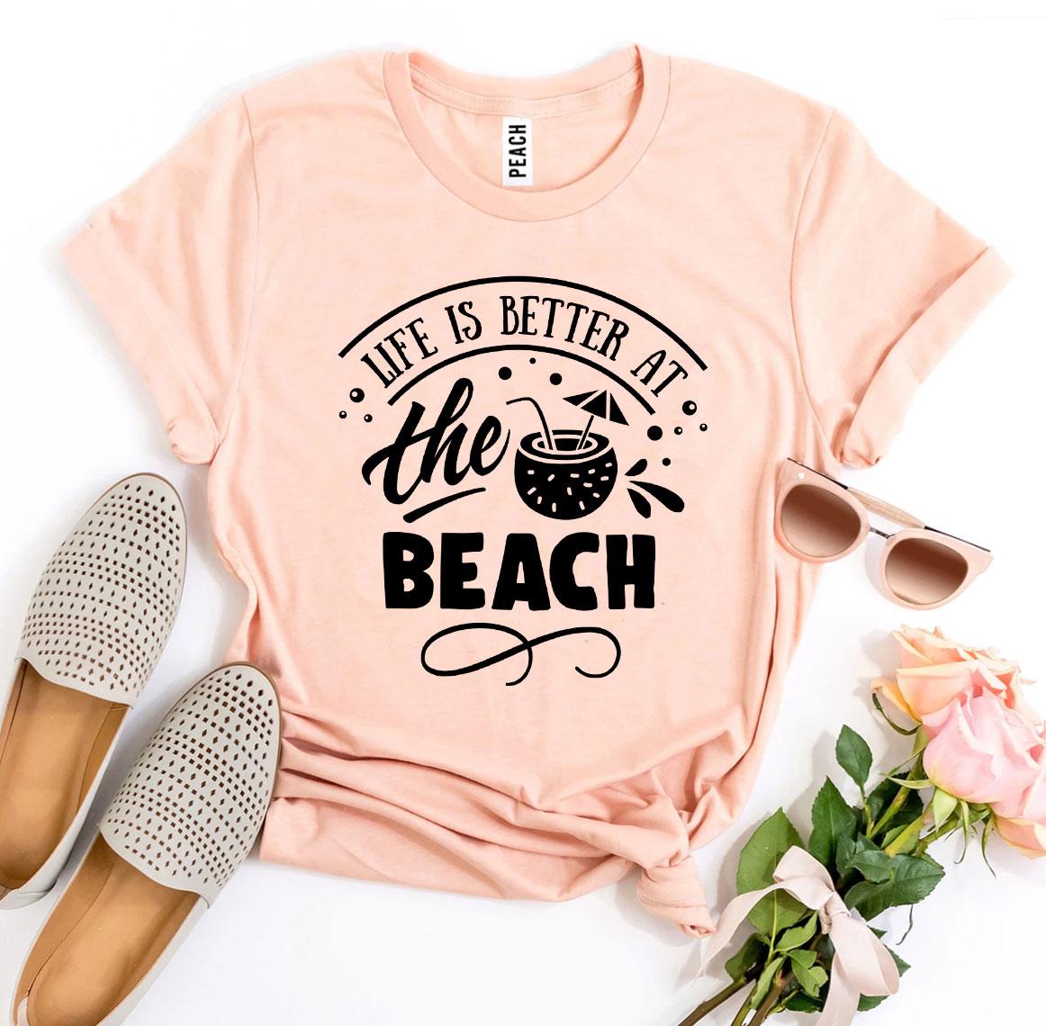 A stylish 'Life Is Better At The Beach' T-shirt made from premium ring spun cotton, featuring a vibrant flex print design.