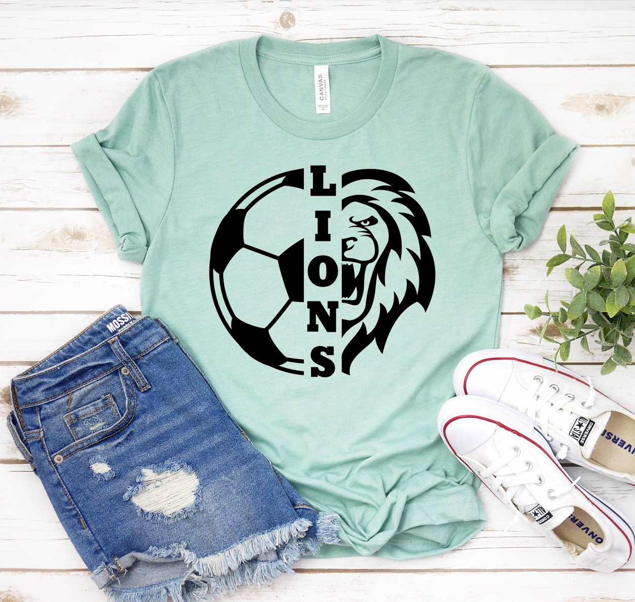 Lions Soccer T-shirt in various sizes, showcasing its soft fabric and classic design.