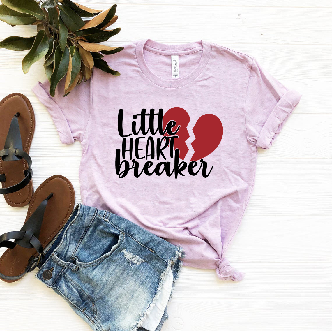 A stylish unisex Little Heart Breaker Shirt made from soft ring spun cotton, available in various colors and sizes.