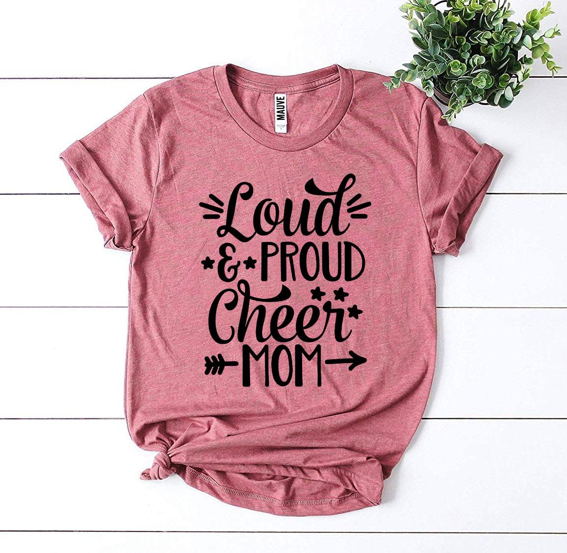 Loud And Proud Cheer Mom T-shirt in vibrant colors, showcasing a stylish design made from premium quality cotton.