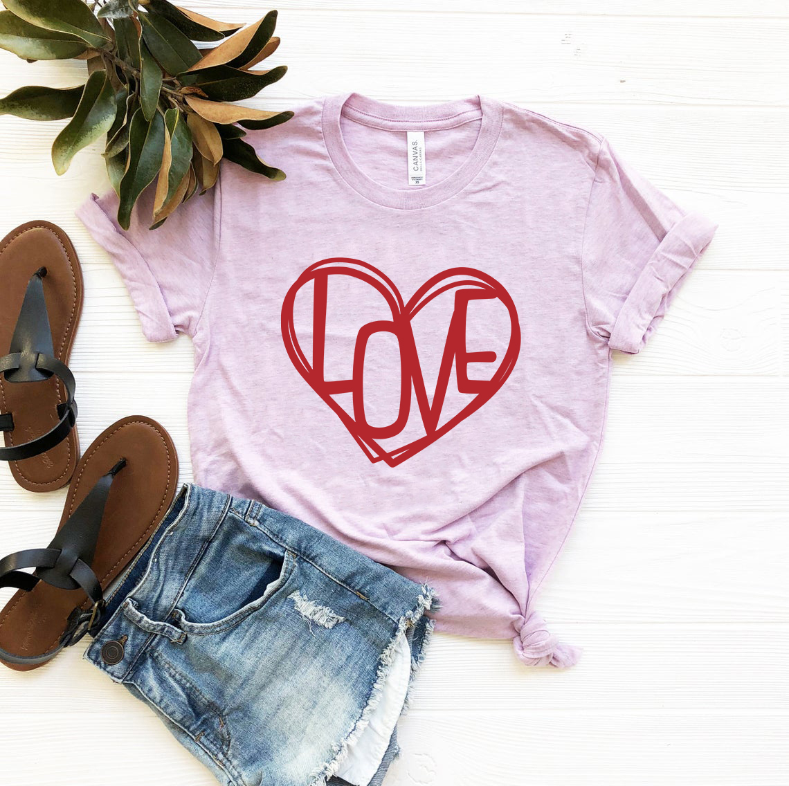 A vibrant Love Heart Shirt displayed in various colors, showcasing its soft fabric and stylish design.