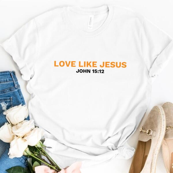 A stylish unisex t-shirt featuring the phrase 'Love Like Jesus' in a modern design, made from soft Ringspun Cotton.