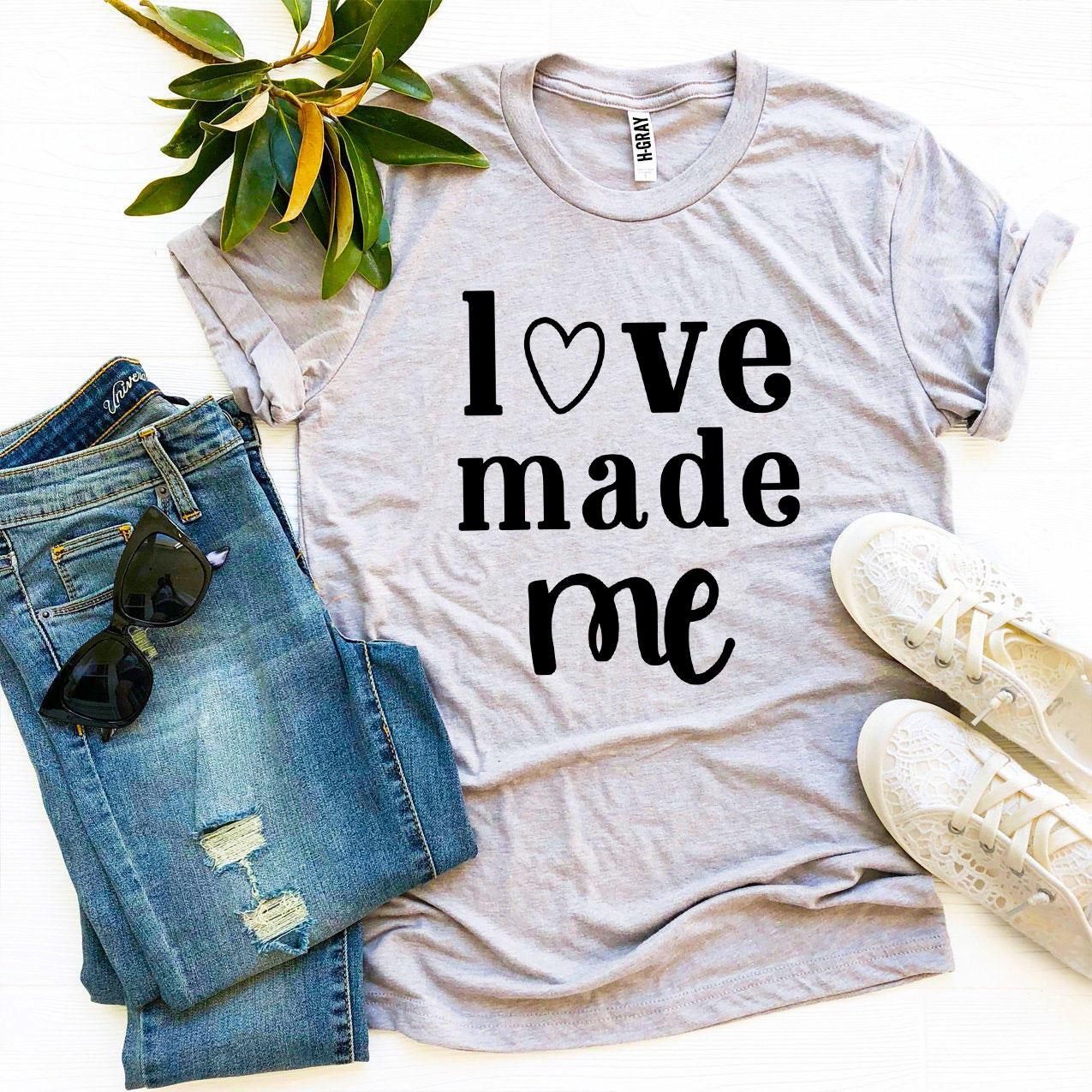 Love Made Me T-shirt made from premium ring spun cotton, featuring a soft textile flex print design.