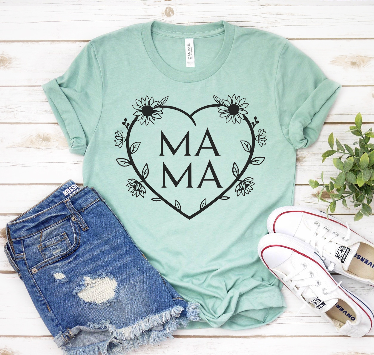 Love Mama T-shirt in various sizes, showcasing its soft fabric and unisex design.