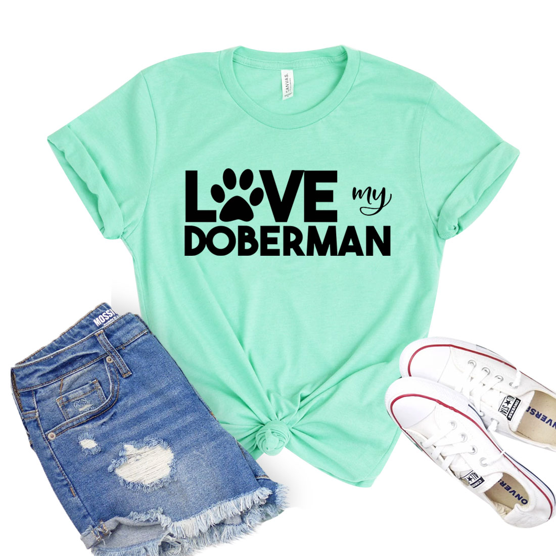 A stylish Love My Doberman T-shirt featuring a graphic design celebrating Doberman dogs, made from soft cotton fabric.