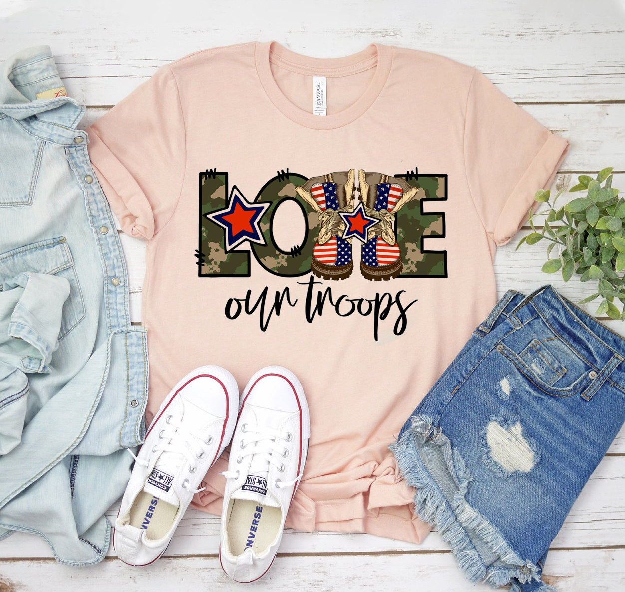 Love Our Troops T-shirt featuring a classic unisex design made from soft airlume cotton, available in various sizes.