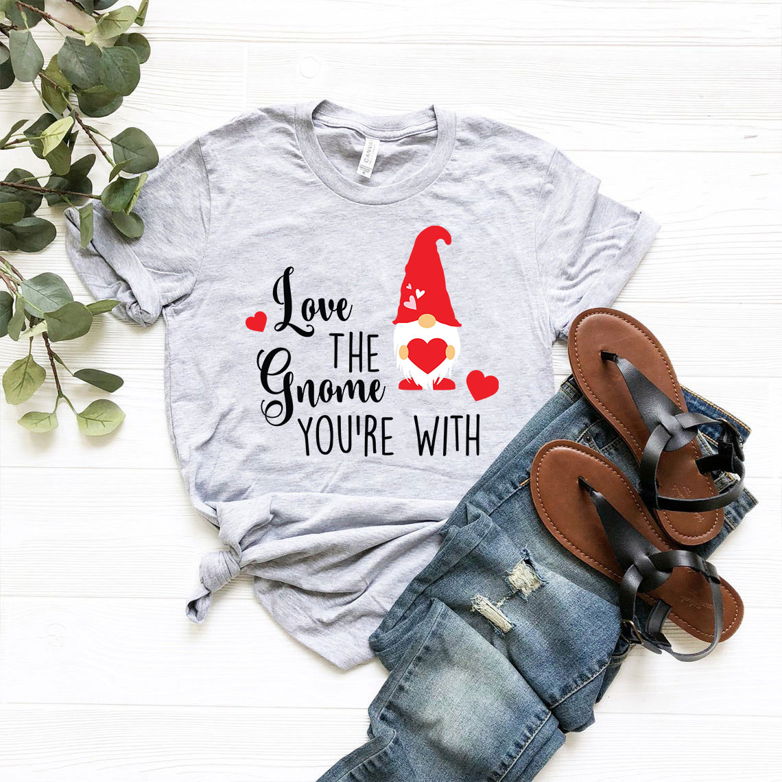 Unisex 'Love The Gnome You Are With' T-shirt in various colors, showcasing its soft fabric and vibrant print.