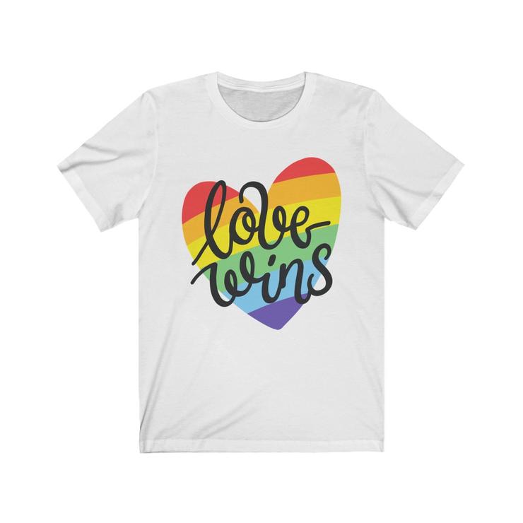 A colorful Love Wins LGBT Pride Rainbow Heart shirt, showcasing a vibrant heart design symbolizing love and acceptance.