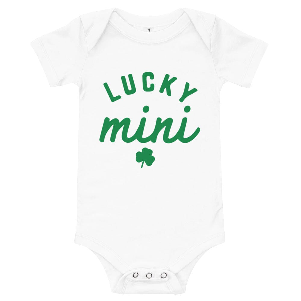 A colorful Lucky Mini Onesie displayed on a soft surface, showcasing its cute design and comfortable fabric.