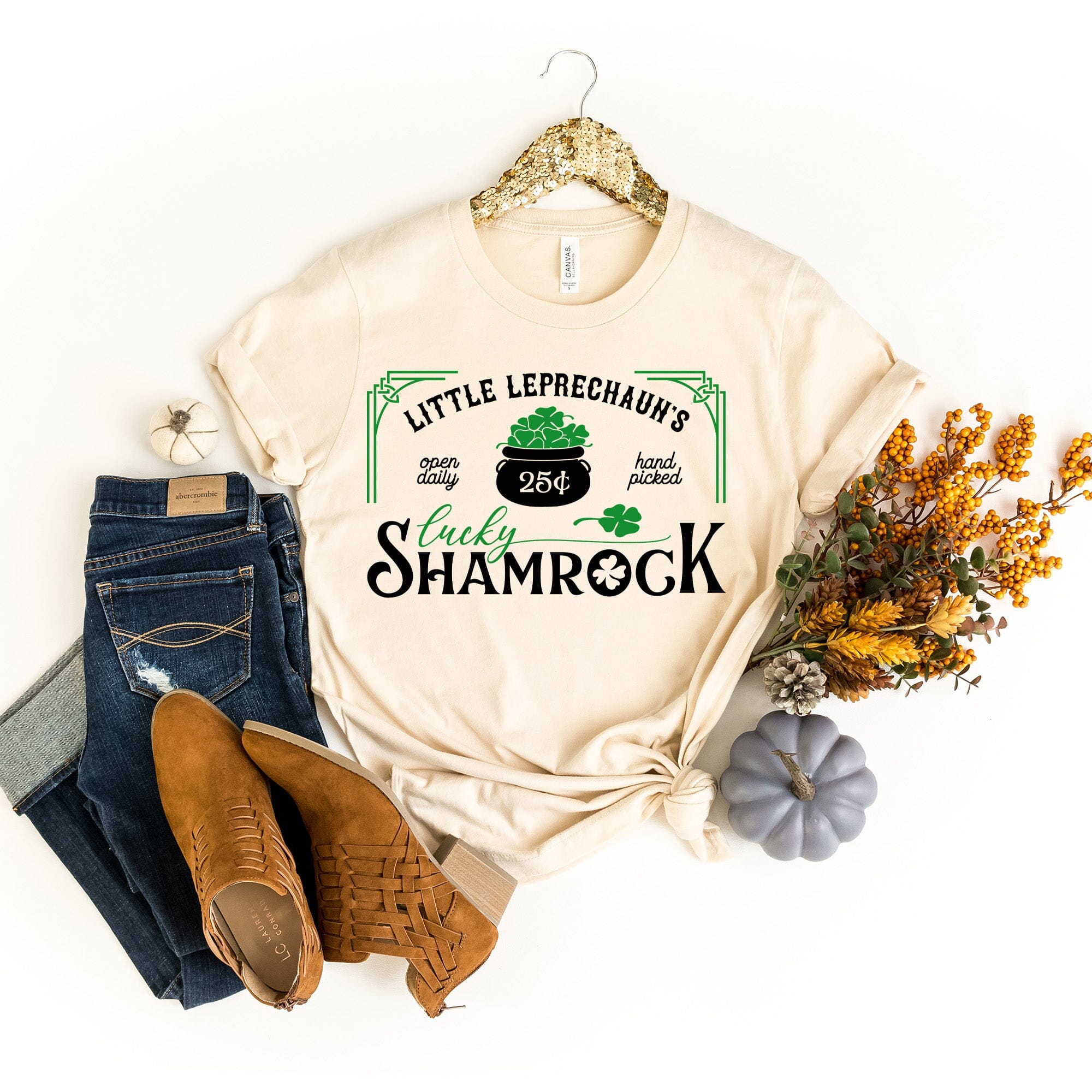 Lucky Shamrock Tee featuring a vibrant shamrock design on a comfortable cotton fabric, perfect for casual wear.