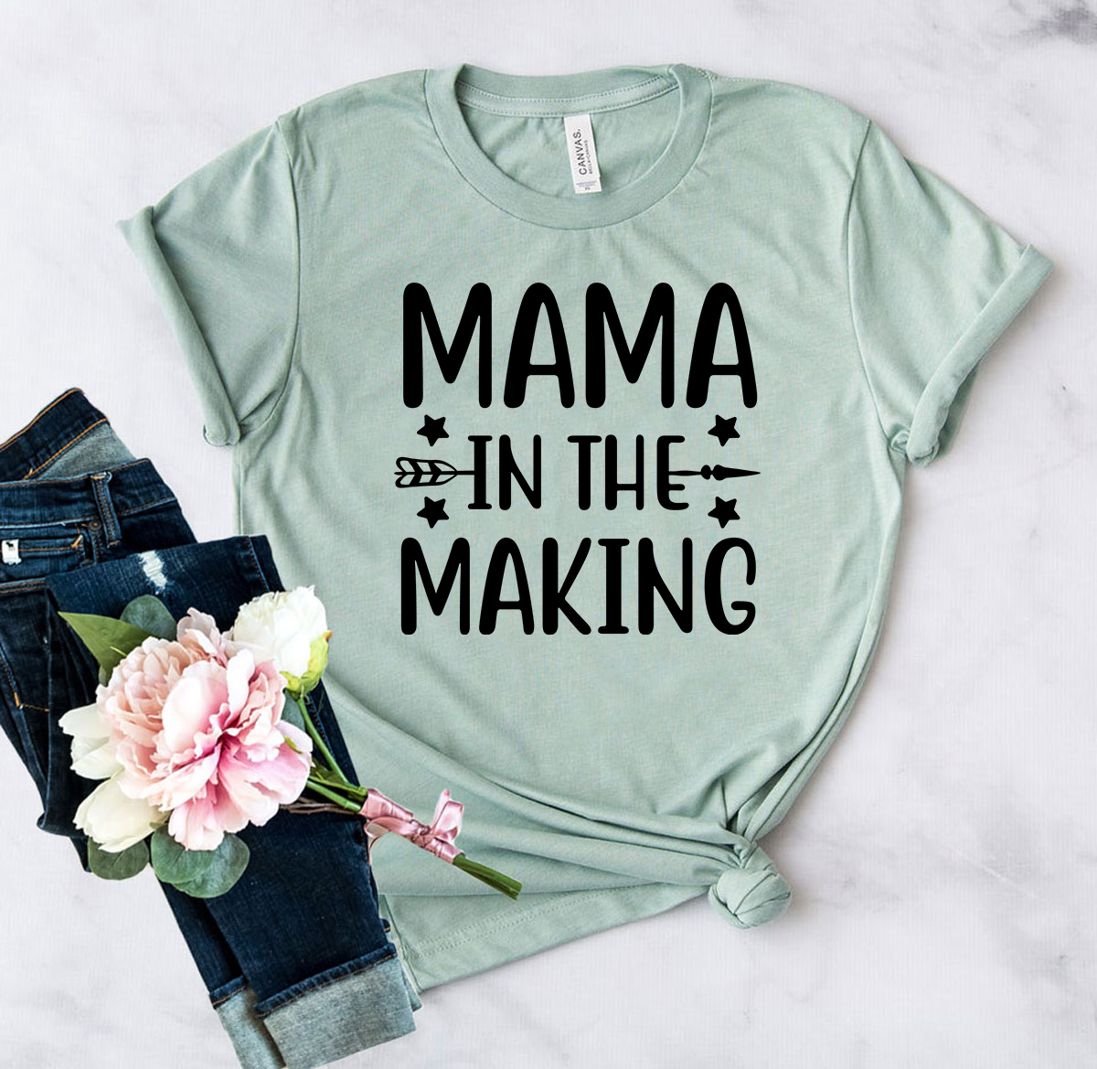 Mama In The Making Shirt displayed in various colors, showcasing its soft fabric and stylish design.