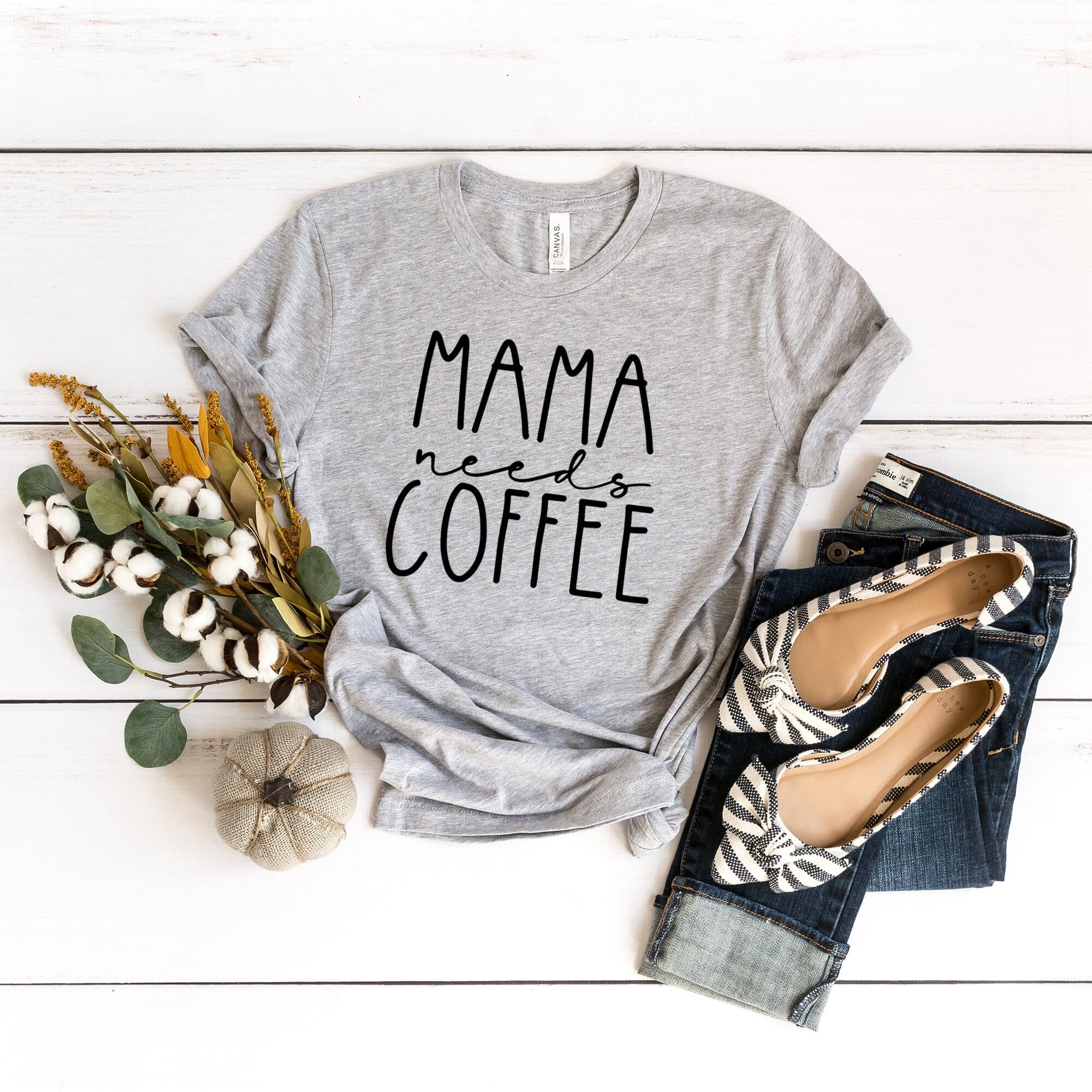 Mama Needs Coffee Tee featuring a stylish design, made from soft Ringspun Cotton, perfect for coffee lovers.