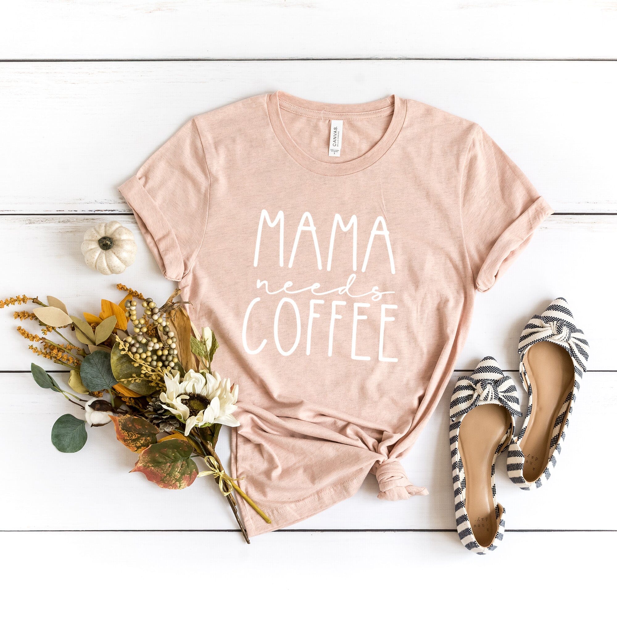 Mama Needs Coffee Tee featuring a stylish design, made from soft Ringspun Cotton, perfect for coffee lovers.