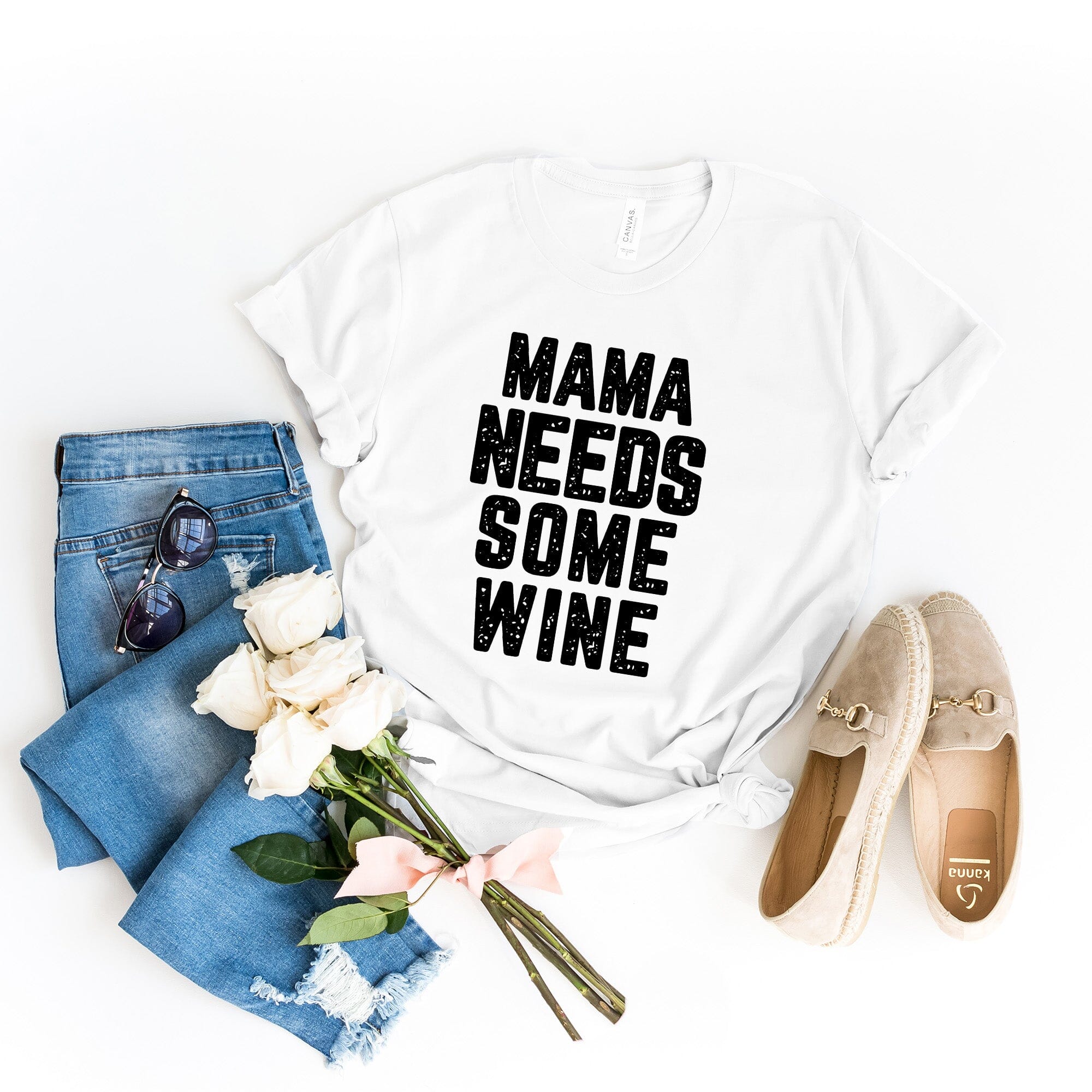 A stylish Mama Needs Some Wine Tee featuring a humorous design, made from soft Ringspun Cotton, perfect for casual wear.