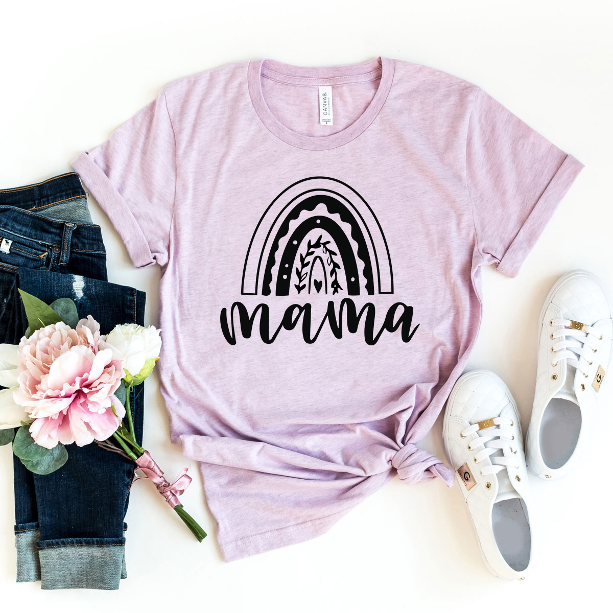 A stylish unisex Mama Shirt made from soft ring spun cotton, available in various colors and sizes, featuring a classic crew neck and short sleeves.