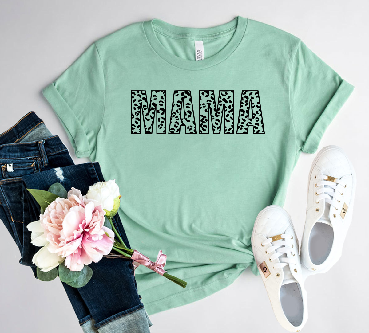 A stylish unisex Mama Shirt made from soft ring spun cotton, available in multiple colors and sizes.