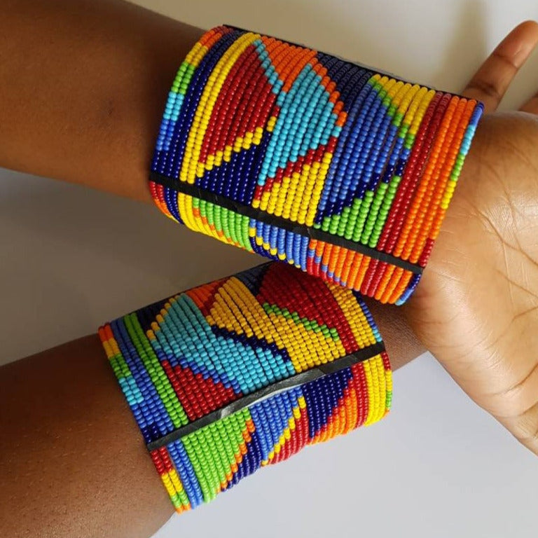 Handmade Maasai wrist bracelet featuring colorful beads and leather, showcasing traditional Kenyan craftsmanship.