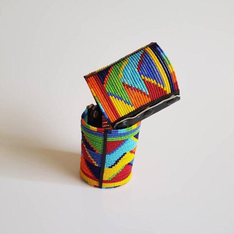 Handmade Maasai wrist bracelet featuring colorful beads and leather, showcasing traditional Kenyan craftsmanship.