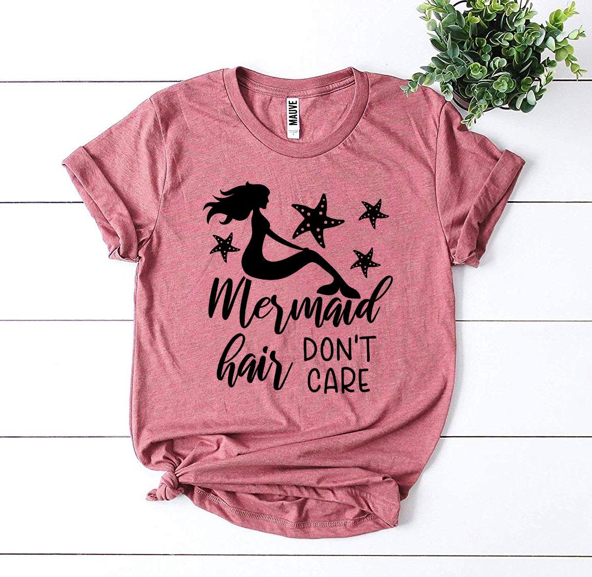 A stylish Mermaid Hair Don’t Care T-shirt made from premium ring spun cotton, featuring a vibrant print and available in various sizes.