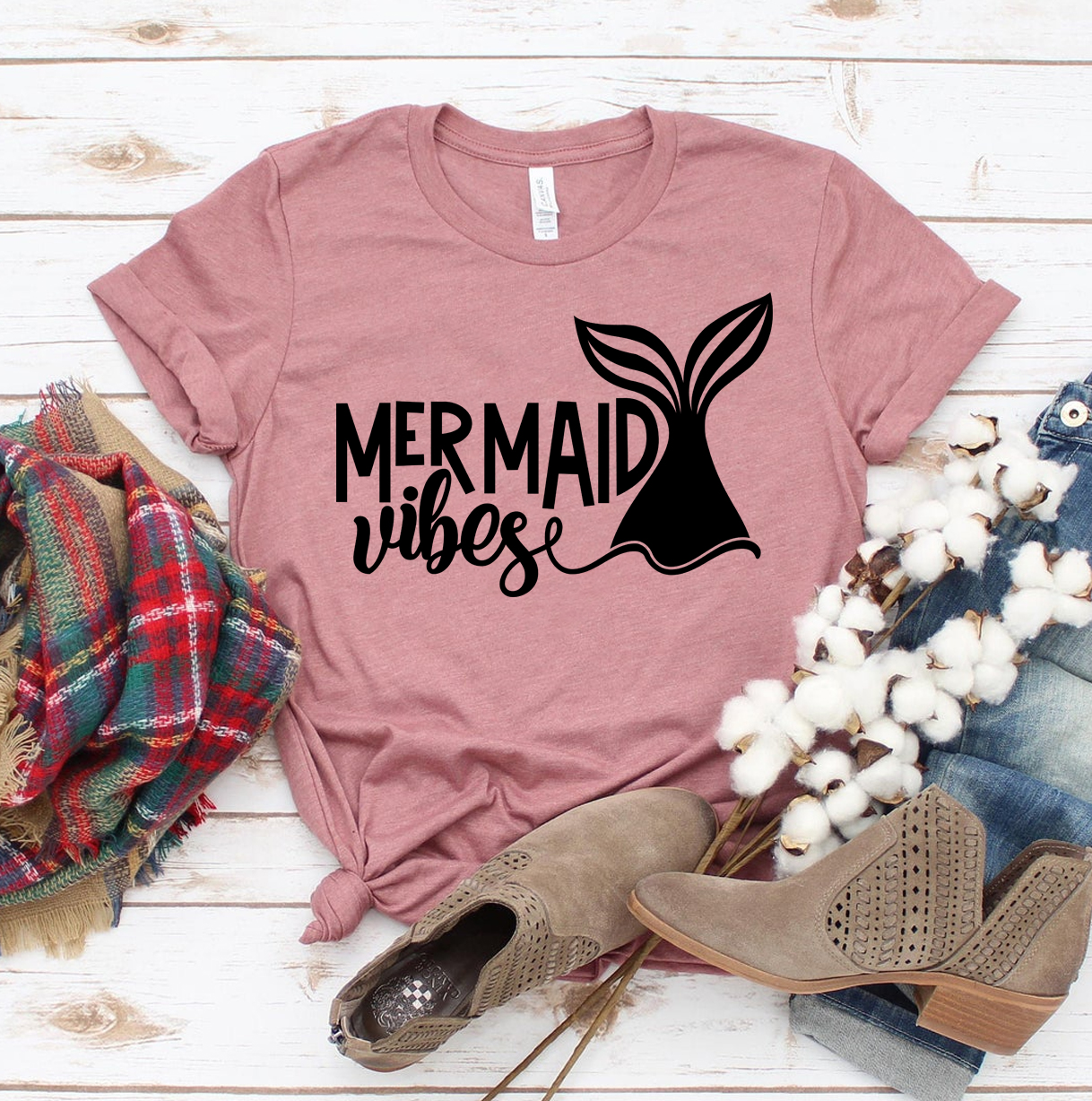 A stylish Mermaid Vibes T-shirt made of premium ring spun cotton, featuring a vibrant ocean-themed design.