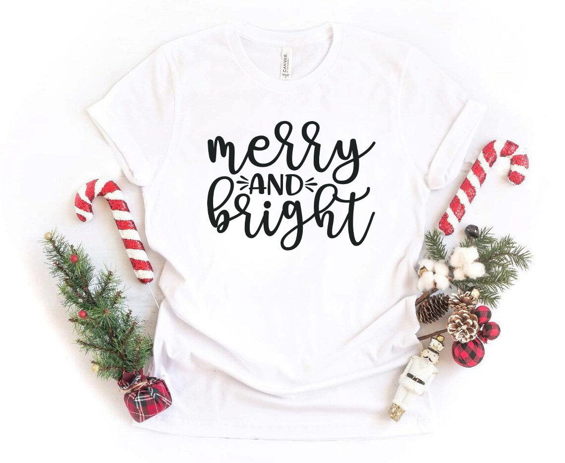 Merry And Bright Shirt displayed in various colors, showcasing its comfortable fabric and stylish design.