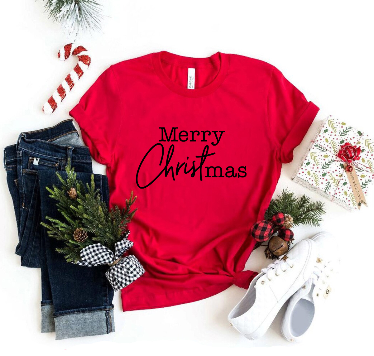 A Merry Christmas Shirt featuring a festive design, crafted from soft ring spun cotton, available in multiple colors and sizes.