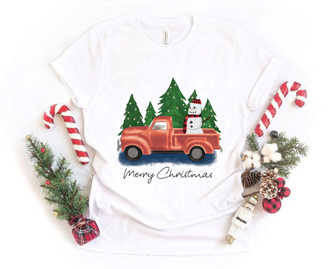 A Merry Christmas Shirt featuring a festive design, made from soft ring spun cotton, available in multiple colors and sizes.