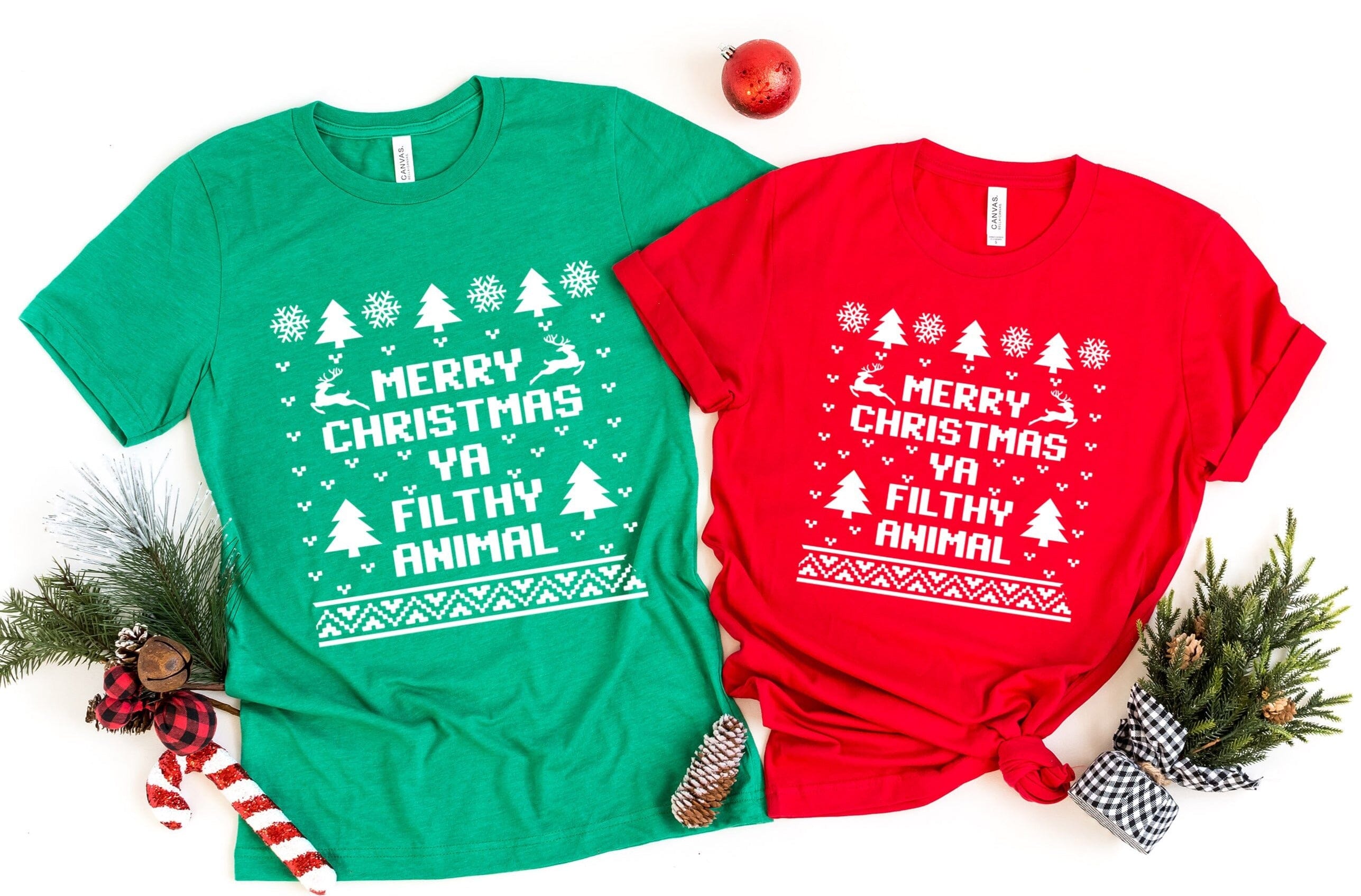 Merry Christmas Ya Filthy Animal Tee featuring a playful holiday design in a comfortable fit, perfect for festive celebrations.